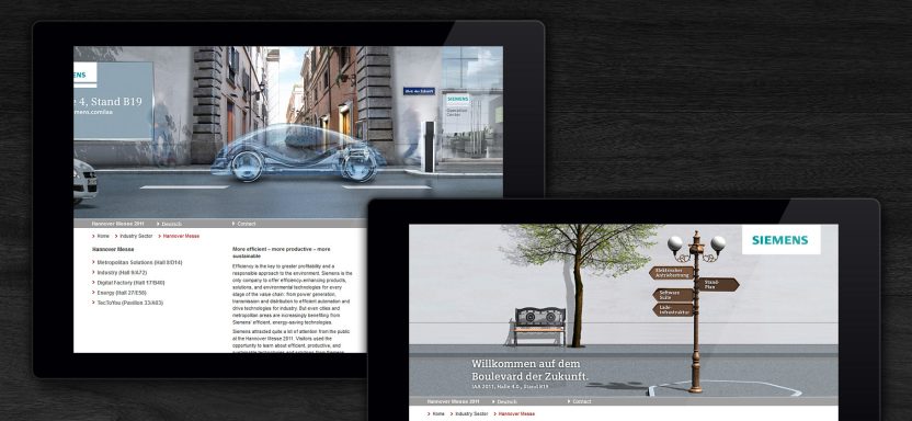 Zwei Tablets zeigen städtische Szenen mit Autos und Wegweisern.